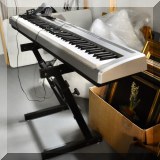 E02. Yamaha P95 digital keyboard. 